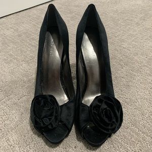 Satin black peep toe pumps